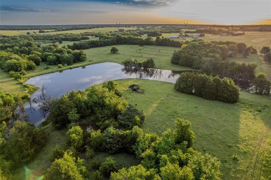 Welcome to your North Texas dream property, offering the ultimate retreat for hunting, fishing, and outdoor enthusiasts. This 98 acre gem features 2 large, stocked bass ponds and a smaller tank, making it a perfect destination for fishing and waterfowl hunting. The property is abundant with wildlife, including deer, turkey, hogs, and predators, providing exceptional hunting opportunities year-round. The winding creek flows through 20 acres of untouched wildlife sanctuary, creating a serene environment for both nature lovers and hunters alike. With rolling hills and diverse terrain, this property offers a variety of settings for hunting, hiking, and ATV riding. Enjoy the privacy and seclusion of this property with access via a private county road. Potential future home sites or homestead, offering the ideal location for your dream home or weekend getaway. The old barn, located near the entrance gate, already has an electrical box in place, just needs to be connected. The property is fenced and cross-fenced, with a healthy mix of pasture and timber. No floodplain or restrictions, providing endless possibilities for use. With water available at the county road and easy access to HWY 82 and HWY 121, you’ll be just minutes from Bonham, Sherman, and Denison, and less than an hour from the DFW suburbs. This is a rare opportunity to own a versatile and recreationally rich property, offering both tranquility and adventure. Don’t miss out on your chance to own this incredible North Texas hunting and fishing haven!