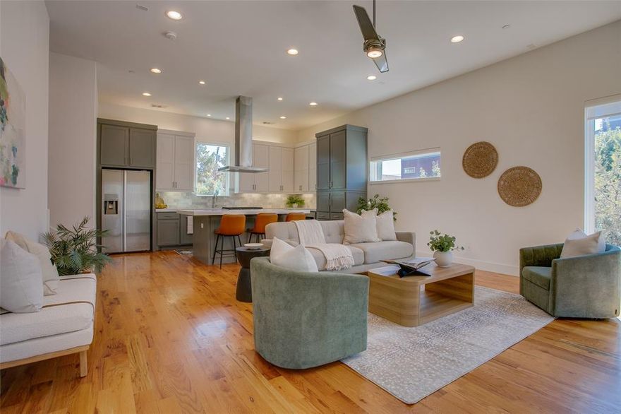 Lower Greenville, Knox-Henderson, Downtown, Klyde Warren, Uptown, Deep Ellum, Farmer's Market, White Rock, Katy Trail...all within a few minutes drive from this gated and well kept corner unit.  Incredible natural light fills each floor from East, West and South exposures.  The backyard features 'party lights' and is turfed and ready for your lounge set and grill to enjoy the cooler temps. The kitchen offers a gas cooktop and features a large island; the oversized living space offers plenty of room if you prefer a formal dining configuration.  Both bedrooms offer en-suite baths with walk-in closets; the primary features a third tier for hanging. Full size two-car garage with overhead storage.