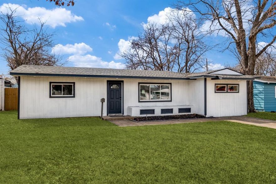 Beautifully remodeled 1953 home with 3-bedroom, 2-bathroom property blends classic charm with modern upgrades throughout. The home features elegant gray laminate flooring, new windows, fresh paint, and updated wall texture, creating a bright and welcoming atmosphere. The spacious kitchen offers luxurious white cabinetry, included range and microwave, a stylish backsplash, and a functional breakfast bar that opens to the living area—perfect for everyday living and entertaining. The primary suite includes a private bathroom and walk-in closet, while two additional bedrooms share a full bath. Both bathrooms showcase modern marble-look epoxy finishes with matching cabinets and mirrors. Additional highlights include a dedicated laundry area, double doors leading to the backyard, a covered patio, and a fenced yard for added privacy. All completely updated and move-in ready. Come see this fantastic home and fall in love with this wonderful opportunity for you and your family.