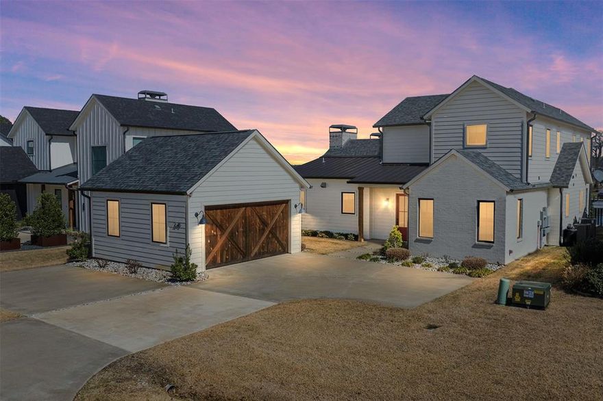 Beautiful modern farmhouse situated on an elevated lakefront lot on the deep waters of Cedar Creek Lake, offering panoramic views and excellent water depth for the ultimate lake lifestyle. This bright and inviting home showcases a thoughtfully designed open-concept layout with oversized windows that frame your lake views from nearly every room. Soft modern finishes for a seamless connection between the gourmet kitchen, spacious living area, and dining space, ideal for everyday living and effortless entertaining. Chef-inspired kitchen - top-of-the-line appliances includes a Bertazonni oven, abundant custom cabinetry, a large island with seating - perfect for gathering and entertaining. Secondary bedroom with a full bath is conveniently located on the main level. The first-floor primary suite captures peaceful lake views and includes a luxurious ensuite bath designed for relaxation. Upstairs hosts a second living area that includes built in bunk beds, two generously sized bedrooms with ensuite baths — offering ample space for family and guests. Your outdoor living is equally impressive, featuring a covered patio with an outdoor fireplace and plenty of space for relaxing or hosting. Patio heaters and an insect control system with spider-mosquito misting around the perimeter of home - for year-round enjoyment. Large fenced backyard provides space for pets, play, or quiet outdoor enjoyment. The composite dock offers covered seating along with an expansive party deck, perfect for entertaining or soaking in the tranquil waterfront setting. Retaining wall installed 2021 & sea wall installed 2023. Located in Driftwood Farm, a private gated community of only 10 homes, this property combines privacy and seclusion with convenient access just over an hour from Dallas. Blending modern luxury with relaxed lake living, this home is an exceptional opportunity to enjoy life on Cedar Creek Lake. Furniture, boat, jet ski negotiable. Please see Transaction Desk for upgrades & floorplan.
