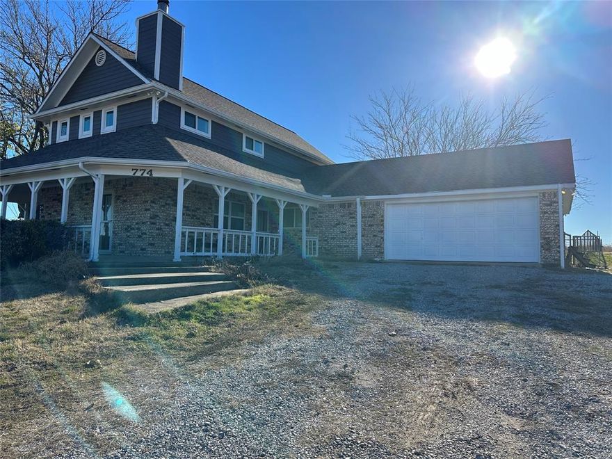 4B2B house in the country. There is 60X40 insulated shop with concrete floor and electric with two overhead doors on the front and one overhead door in the back. There is also a separate  20X50 5 bay storage with concrete floor as well.   Enjoy the country life.