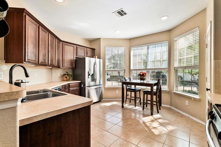 **Special Financing available with this home. Contact Listing Agent for more details!** Home conveys with Refrigerator, Washer, & Dryer! Step into the charm of this inviting Craftsman-style home with a subtle beachside vibe. Featuring 3 bedrooms, 2.5 baths, and soaring two-story ceilings, this home blends character with comfort. Freshly installed carpet, spacious bedrooms, and generous walk-in closets make everyday living feel effortless. What makes this home truly special are the cozy nooks and charming spaces designed for relaxation—a sunny bay window off the kitchen that’s perfect for sipping your morning coffee, a second-story balcony ideal for unwinding at sunset, or a classic front porch swing that captures the timeless Craftsman feel. Whether you’re a first-time homeowner, growing your family, or looking to downsize in retirement, this home offers a perfect fit for every stage of life. The community is rich with amenities including sparkling pools, playgrounds, sports courts, and fitness centers—ensuring there’s always something to enjoy just steps from your door. Conveniently located, you’re only 5 minutes from everything you need—shopping, dining, and entertainment. This is a home that truly combines lifestyle, location, and charm.