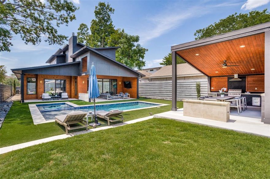 Modern Luxury summer paradise! This home lend itself to great indoor outdoor living. The large cabana addition is equipped with full kitchen, TV, dining and firepit. L Shaped pool offers endless hours of summer fun with family & friends. Large gallery eat in kitchen with high end gas stove, dishwasher, water filter and build in fridge. The wide island is perfect for entertaining and flow to dining and wine room. Exit living room via wall to wall sliding doors and relax on the covered patio overlooking pool. The architectural canvas offers a blend of desirable spaces. The downstairs master suite has shower bath, double vanities, large walk in closet and private outdoor patio. 2nd bedroom down is used as an office space to suit owners needs. Second floor game room, split bedroom with double sink bathroom and walk in closets and laundry. Semi master on suite. The home is wired for sound, high speed internet, security, commercial vents and speakers throughout the home. The perfect home!