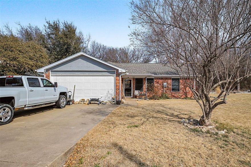 Welcome to this wonderfully priced & beautiful home situated at the head of the Cul-de-sac & backing to a quaint Greenbelt! Sitting on a .297 acre LOT! This home has an abundance of windows & natural light bursting through it, and it features Premium Porcelain Wood Tile Floors throughout the entirety of the house! Easy maintenance & upkeep, plus scratch & water resistant! Each bedroom has solid room and dimensions offering much space, and the kitchen is tucked away from the living a dining spaces, equipped with granite countertops, and a good amount of cabinet space. It's hard to find a home of this quality and value really anywhere in the metroplex, so come and make this one yours today!