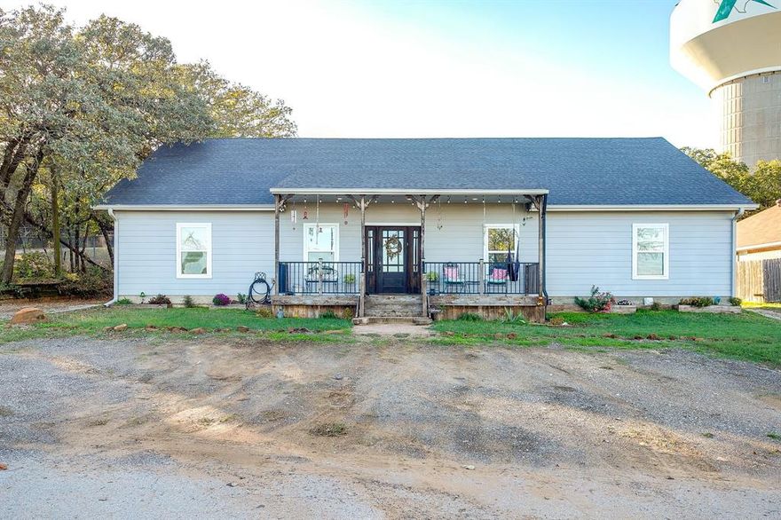 This 4 bed, 2.5 bath home spans 2126 sq ft and offers an open floor plan with abundant natural light in the main living areas. The covered porches, front and back, are the perfect place to relax and enjoy the outdoors while the circle drive adds convenience, easy access and extra parking options. The workshop provides ample space for tools, storage, creative projects... possibilities are endless! 
There is a 570 sq ft garage apartment featuring 1 bed, 1 bath- ideal for guests, extended stays, or additional income opportunities!
Plus the attic!  The walk-in attic provides TONS of easily accessible storage space, a very unique bonus!  
This adorable house is a must-see!