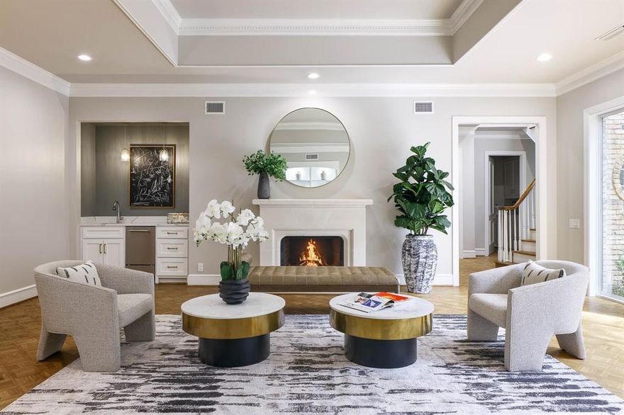 Exquisitely renovated, this Caruth Homeplace residence combines timeless architectural design with today’s modern finishes in one of Dallas’ most desirable communities. Originally designed by Jim Williams and completely reimagined by renowned Park Cities builder Lyle Turner of Malt Homes, the home now showcases Monticello parquet wood floors, quartzite and marble surfaces, and designer hardware for a refined, cohesive look. Tucked away on a quiet cul-de-sac, this lock-and-leave property offers the best of Caruth Homeplace living with private security, a community pool, tennis courts, and clubhouse—all in a central Dallas location. Inside, a bright, eat-in kitchen with Sub-Zero, U-Line and Bosch appliances opens to formal and casual living areas designed for effortless entertaining. Expansive sliding doors connect the oversized family room to the patio, creating seamless indoor-outdoor living. The downstairs primary suite features dual walk-in closets, a spa-like updated bath, and private patio access, while additional guest suites offer flexibility for family, visitors, or a study. Upstairs, a versatile game room or fourth bedroom includes built-ins, a wet bar, and abundant storage. With its extensive updates, natural light, and move-in-ready style, this home stands out as a rare opportunity in coveted Caruth Homeplace.