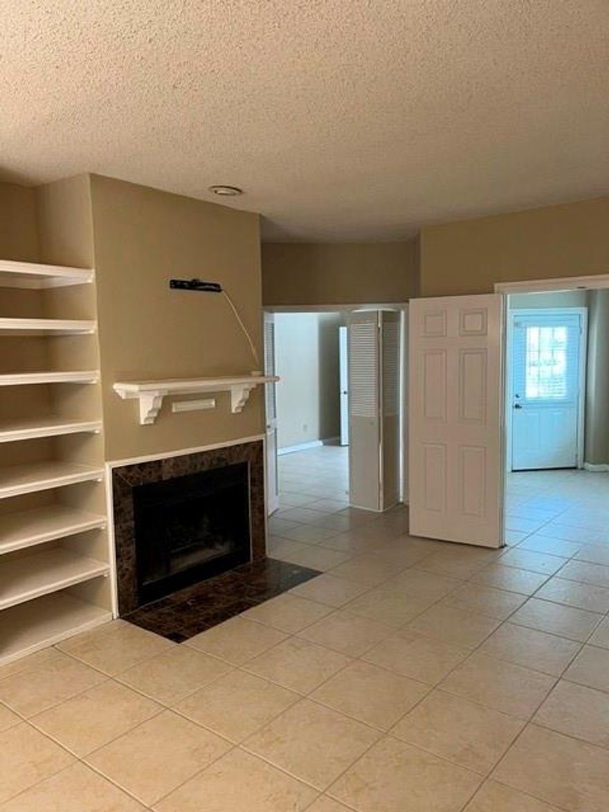 Very nice 1 bedroom condo located on the ground floor * Seller is offering a $5000 credit for closing costs and another $3000 credit for further remodeling. * This is an end unit and has a flex room that could be a den-study, office, nursery, hobby, or work out room * pool area is located very close by just outside the back patio door. Convenient to shopping, restaurants, and highways. Most of the updating has been done. Updated natural stone countertops in the kitchen and bath, tile floors throughout, 2 inch faux wood blinds,throughout. Water service is included thru the HOA. This is a well managed HOA with a generous reserve fund for future needs.  Complex has electronic entry gates to drive into and out of the parking area and also to walk into the complex at the front entry gate. This condo is priced to sell and will likely go quickly. (Please see an additional note document in the Transaction document file.)