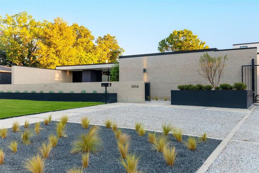 This architectural significant home was brought to life by AM Homes. From the exterior this all brick home reads as a 1-story house. Green grass rises from the street to meet huge metal planters wrapping around the home. The driveway & pavers are lined by crushed limestone. A masonry wall provides privacy & creates a large courtyard. Pewter brick is outlined by dark metal accents. A designer, metal pivot gate controls access. Inside the courtyard a huge planter sits to one side with 4 Patio Holly’s. Your eye is immediately drawn to the floor-to-ceiling windows in the formal living & den allowing one to view through the house into the interior courtyard. A huge metal door opens and at last you are inside. The entry draws you in to the magic that awaits. Initially you notice the green courtyard (think future pool) but quickly your focus returns to the formal living and dining. Want to know more? Come and see the home for yourself! 

Partial list of specifications in Private Remarks.