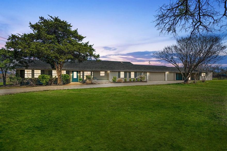 Experience the best of country-style living on 1.67 acres in Anna, TX, offering space, versatility, and beautiful views while still being conveniently close to major roads, shopping, and dining. With its inviting drive-up appeal and peaceful setting, this property truly feels like a private retreat.

Equestrian enthusiasts will appreciate the barn with four stalls and a round pen, while the property also provides plenty of parking and workspace with a three-car garage plus a three-car carport. Just beyond the carport are two additional finished rooms totaling approximately 200 sq ft of air-conditioned space, perfect for a home office, hobby area, workout room, or extra storage.

Relax on the welcoming covered front porch or head to the backyard where outdoor living shines with a deck, patio, and a beautiful gunite in-ground pool, ideal for entertaining or cooling off on warm Texas days.

Inside, the living room impresses with a vaulted ceiling, crown moulding, and picture frame moulding, along with an amazing view of the surrounding property. A woodburning brick fireplace with raised hearth adds warmth and charm. The kitchen offers a smoothtop cooktop and abundant cabinetry for all your storage needs.

A second living area features a wall of windows, perfectly framing the scenic outdoor views and filling the home with natural light. The primary suite includes a large skylight, a stylish barn door leading into the bath, dual sinks, a separate frameless shower, and a spacious walk-in closet.

Features new HVAC with smart thermostat (2022), new roof (2024), pool resurfacing (2024), and new pool pump (2025). With acreage, equestrian amenities, flexible living spaces, and wonderful outdoor features, this Anna property offers the perfect balance of privacy, comfort, and convenience.