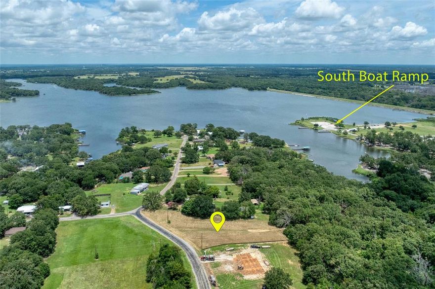 Situated on a generous expanse of just over one acre on Lake Bonham, this lakeside lot presents an extraordinary opportunity to create your dream sanctuary in a serene and picturesque location. Whether you envision a modern architectural marvel or a quaint countryside retreat, this blank canvas eagerly awaits your creative touch. The property boasts water access, allowing for recreational possibilities such as kayaking, fishing, or simply soaking in the stunning views that transform with each season. While the property currently lacks residential structures, it provides a rare opportunity for customization without the constraints of pre-existing designs. Restrictions require a minimum of 1000 sq ft living space and no manufactured or mobile homes.