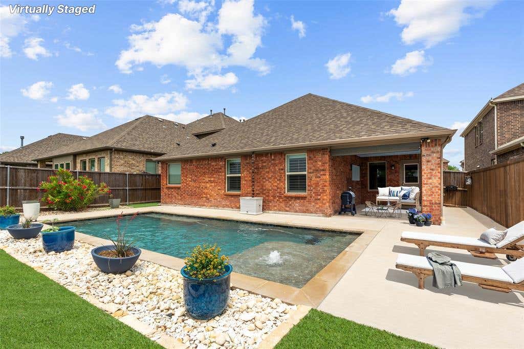 Photo of 6909 Danridge Road, Rowlett, TX 75089 (MLS # 21263267)