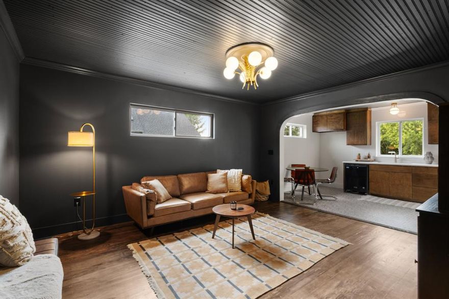 Storybook charm meets modern living in this fully remodeled historic home just a short stroll from the Decatur Town Square. Completely remodeled 2 bedroom, 1 bath home offering 1,073 square feet of thoughtfully designed living space. Full of charm and character, this move-in ready property seamlessly blends modern updates with original details, featuring beautifully restored original wood floors and beadboard ceilings, custom archways, and abundant natural light throughout. The spacious eat-in kitchen serves as the heart of the home and is equipped with quartz countertops, updated cabinetry, a walk-in pantry, dishwasher and a functional layout perfect for both everyday living and entertaining. Just off the kitchen, a large dedicated laundry room provides added convenience and extra storage space. A bright and inviting sunroom adds valuable flexible space and can easily function as a home office, playroom, or creative studio. The fully renovated bathroom showcases clean, timeless finishes and contemporary fixtures. Both bedrooms are generously sized and include custom closet systems, maximizing storage and organization. Extensive recent upgrades include new windows, a new roof, and new siding, offering improved energy efficiency and long-term peace of mind. Outdoor living is just as inviting, with both front and back porches providing ideal spaces to relax and unwind. The oversized backyard offers plenty of room for entertaining, pets, gardening, or future additions. Located just steps from local dining, shopping, and community events, this home offers the perfect combination of historic charm, modern functionality, and walkability in one of Decatur’s most desirable areas. Schedule your private showing today and experience everything this beautifully updated home has to offer.