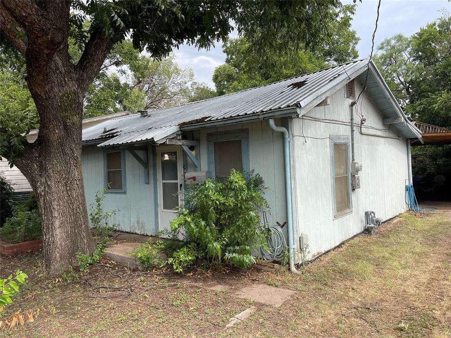 Investor Special in Prime Abilene Location! Bring your contractor and vision to this four bedroom, two bath fixer upper with tremendous upside. The home has been recently lived in and features a durable metal roof, detached garage, and two additional storage sheds. Situated on an extra-deep 265 foot lot, the property offers ample space and potential for a secondary dwelling. Buyer to verify zoning and restrictions. Mature, large trees provide shade and character, enhancing the lot’s appeal. Located at 2850 S 5th Street, Abilene, TX, this is a rare opportunity to add value in one of the hottest deals within one of Texas’ hottest markets. Don’t miss your opportunity on this promising property—schedule your showing today! Owner is agent.
