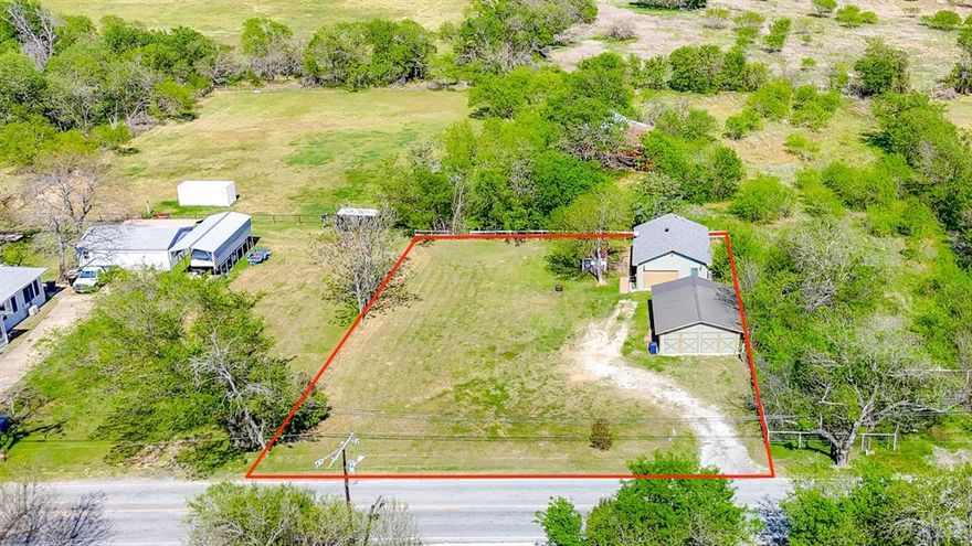 Build-Ready property with immediate living option in Blooming Grove, TX! Opportunities like this are hard to find. This 0.44-acre lot in Blooming Grove is not just land - it's a ready to use property with built-in flexibility and value. With all utilities already installed, you avoid the biggest upfront costs and delays that typically come with raw land. Even better, the property includes an existing 1-bedroom, 1-bath apartment with an older detached two car garage, giving you the rare advantage of living on-site while you build. Or generating rental income from day one. Whether you're planning a custom home, looking for a smart investment, or wanting a low-risk entry into land ownership, this property checks the boxes. Save thousands on utility setup and prep work. Live or rent immediately with the existing apartment. Build at your own pace without carrying two properties. Strong location near Corsicana, Waxahachie, and Hillsboro for work, shopping, and dining. Quiet, small-town setting with convenient access to schools and major highways. This is a practical, cost-efficient opportunity for buyers who understand the value of time, infrastructure, and flexibility. Properties with this combination of utilities, livable structure, and build potential don't last long. Schedule your showing today!