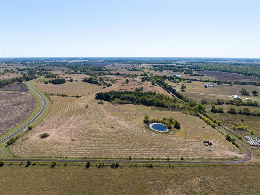 This 10-acre tract, one of 12 available for sale, is perfectly situated just south of Paris, TX. With road frontage on three sides, the property offers excellent access and plenty of flexibility for a homesite, weekend retreat, or investment. A scenic pond adds a distinctive touch, attracting wildlife and enhancing the natural beauty of the landscape. Just minutes from the small town of Roxton, you’ll enjoy convenient grocery shopping and dining while still experiencing the peace and privacy of country living. This is a rare chance to own a piece of a desirable collection of tracts in a serene, rural setting.