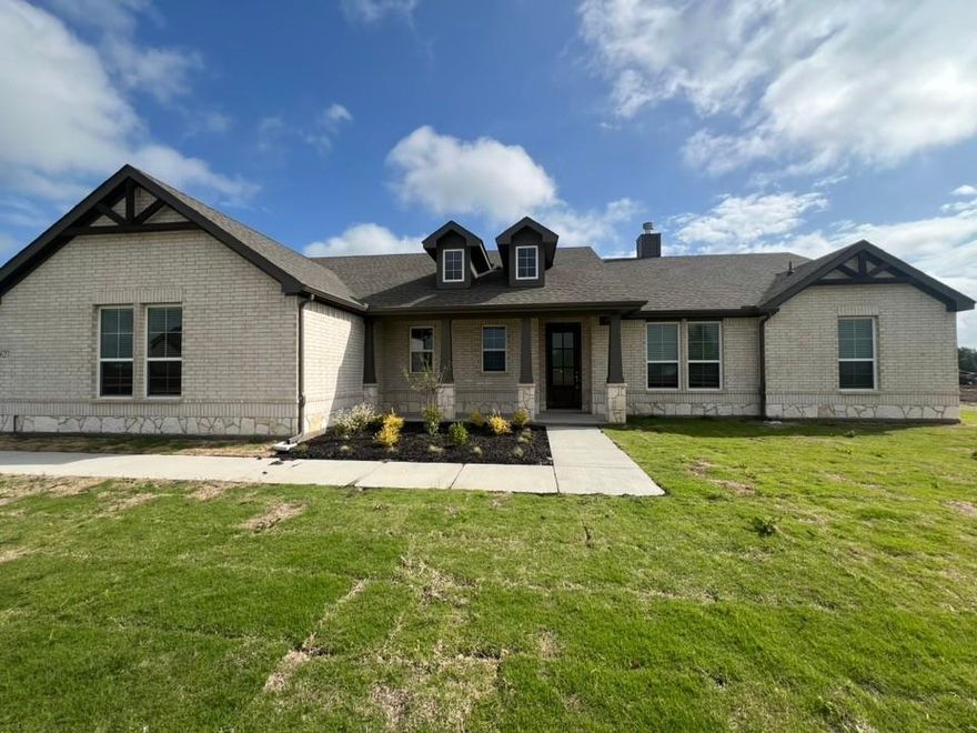 Ask us about our Trade-In Trade-Up Program! We can buy your home when you buy ours! Inside, the 2,033-square-foot plan is designed with the busy family in mind. Keep all the main living concentrated in an open floor plan where walls don’t divide you. Whether you’re watching television in the large family room, entertaining in the dining room, or handling the kitchen duties, you can see everyone and everything. The kitchen’s center island functions like a hub. Sit down for a casual meal at the breakfast bar, sort the mail, catch up on the daily happenings, wash the dishes, or start prepping the next meal. Adjacent to the kitchen, you have the functional center of the home: mudroom and laundry. A hall bench and closet provide you with the organization you need to keep the clutter at bay. Your owner's suite is tucked away in the farthest corner of this single-level floor plan. Separated with a vestibule entrance, you have a private retreat. The owner's bath includes both a soaking tub and walk-in shower, plus dual vanities and a private water closet, so it’s very shareable. The other 2 secondary bedrooms of this split floor plan anchor the other side of the home where they share the second full bath. Both bedrooms are identically sized with plenty of space for anyone from a toddler to teen to another adult member of your household. The Cibolo also gives you the freedom of a flex room off the foyer. Convert it to the space you want to meet your needs.