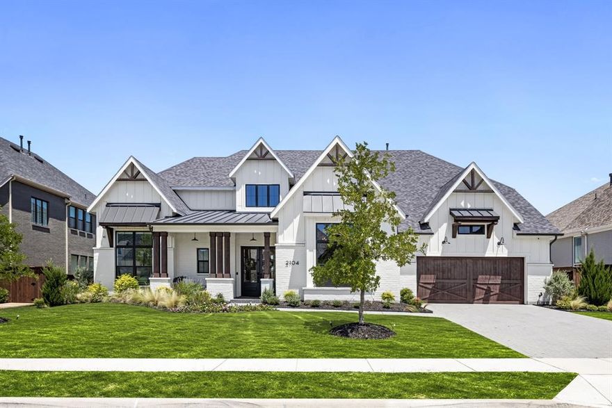 Discover an unmatched level of luxury in the renowned master-planned community of Mustang Lakes, where luxury and comfort seamlessly unite in this extraordinary residence. This elegant home offers exceptional designer & thoughtful details throughout. Step inside to find soaring ceilings, wood floors, designer lighting, & electric blackout remote shades in all bedrooms & office. A private study with built-ins provides a perfect sanctuary for working from home. Every bedroom boasts its own ensuite bath, allowing plenty of privacy for everyone. The gourmet kitchen is a chef's delight, featuring custom white cabinets, stunning backsplash, oversized island, & large walk-in pantry. The spacious family room boasts beamed ceilings and a seamless sliding door that leads you to the backyard escape. The open-concept layout blends the dining area with the family room & kitchen, making it perfect for entertaining and gathering friends and family. The primary bedroom is a serene, spa-like retreat, complete with a freestanding tub, oversized shower, dual vanities & a gorgeous, custom walk-in closet. A connected utility room adds a touch of convenience. Enjoy movie nights or sports in either the upstairs or downstairs media room or gather in the spacious game room upstairs. The backyard oasis is a paradise of its own, offering a place for year-round outdoor enjoyment & entertaining. The backyard features a sparkling pool with a spa & water features, outdoor kitchen with Twin Eagles griddle & grill, hibachi flat top, grill, XXL green egg, refrigerator, plus a relaxing & comfortable patio space. The four car garage provides room for everyone’s vehicles plus storage. Mustang Lakes offers fabulous amenities including resort-style pools, tennis & basketball courts, fitness center, clubhouse, trails, ponds, & parks within top-rated Prosper ISD & Walnut Grove HS zone. This home is a true sanctuary of luxury & comfort, offering an unparalleled living experience.