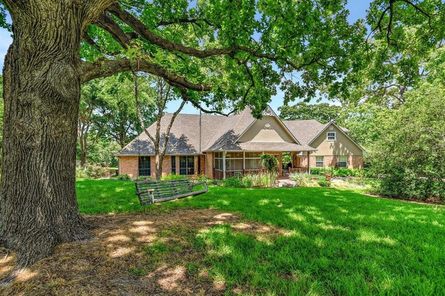 Country living at its best can be found at Seven Oaks Ranch in Pottsboro. Enjoy a heavily treed property for quiet evenings overlooking this sprawling 59+ acre property. A lovely, well maintained one-story home rests several yards back from the road with gated entrance. Vaulted ceilings with beautiful finishes from the decorative fireplace mantle to built in bookcases in the office are in this custom built home. The kitchen, the heart of the home, is situated nicely with views of lush outdoors leading to an attached screened in patio to enjoy morning coffee while catching glimpses of wildlife roaming the ranch. The kitchen has beautiful granite counters, an island, breakfast bar + loads of storage. This home boasts 3 bedrooms with a spacious primary RM+generously sized walk-thru closet. The beauty of this ranch does not soley rest in the custom home, but with the amazing AG exempt land that includes a 2Ksq.ft. Morton Building. Look no further! You have found your country living estate.