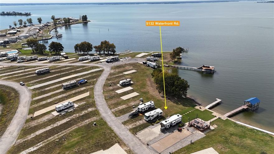 Luxury RV Lot on Open Water! Experience lakeside living at its finest with Lot 30 in the highly sought-after Peninsula Point RV Subdivision on beautiful Richland Chambers Lake. This premium open-water lot offers stunning sunset views and a prime location between the gated entrance and the community clubhouse. Enjoy the perfect combination of convenience, comfort, and relaxation with this ready-to-go lot—where the water tap fee has already been paid, saving you time and money. Just pull in, hook up, and start enjoying the lake life immediately! Peninsula Point is a premier gated community designed for those who appreciate both recreation and resort-style amenities. Residents enjoy access to a sparkling community pool and outdoor clubhouse, a covered grill area, laundry facilities, playground, dog park, private boat ramp, and a secure boat storage area. The subdivision features paved roads, a guard shack, and beautifully maintained common areas that make every visit feel like a getaway. Short-term rentals are allowed, offering an incredible opportunity to generate income when you’re not enjoying the property yourself. Richland Chambers Lake, the third largest lake in Texas, is known for its outstanding fishing, boating, and water sports. Whether you’re looking for a peaceful retreat, a weekend escape, or an investment opportunity, this waterfront RV lot delivers it all. Don’t miss your chance to own a piece of luxury lakefront living—where every day ends with a breathtaking sunset over open water!