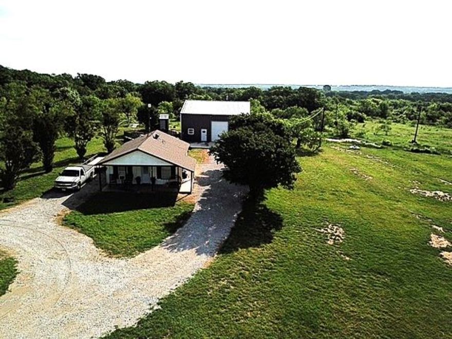 Paradise awaits! Just 45 minutes from the hustle and bustle of DFW, you'll find one of very few, 10-acre tracts, without a single pipeline beneath, nor flood plain atop, an absolute unicorn in north Texas! The current owners have recently updated the cozy 2 bed, 1 bath home at the front of the property, perfect to live on the property while you build your countryside dream home, generate income as a rental, or just enjoy it for yourself as it is. After spending time outdoors, riding horses, riding atvs, or just watching the chickens scratch the ground, relax indoors in the newly constructed, 40x40, spray foam, heated-cooled, epoxy floored shop with loft, and a full bath. Also boasts a large utility room, in case you're tired of relaxing, and it's been fully wired and plumbed for future full kitchen. Outside you'll find 2 large barns with electric and water, one with a storage-tac room and separate stalls.  Also, there is a newly constructed 8x10, insulated well house, great for extra storage, and a new, in-ground storm shelter.  Bring your animals, or just bring yourself, come see what Paradise has to offer.

AG Exemption is current

Farm equipment is negotiable