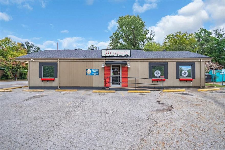 Fantastic downtown Tyler location for your next business. Currently Bruno's pizza. The property has a new roof and AC. Inside there are 2 bathrooms, large dining area, kitchen and a drive through window. Willing to entertain creative financing. Come see today!