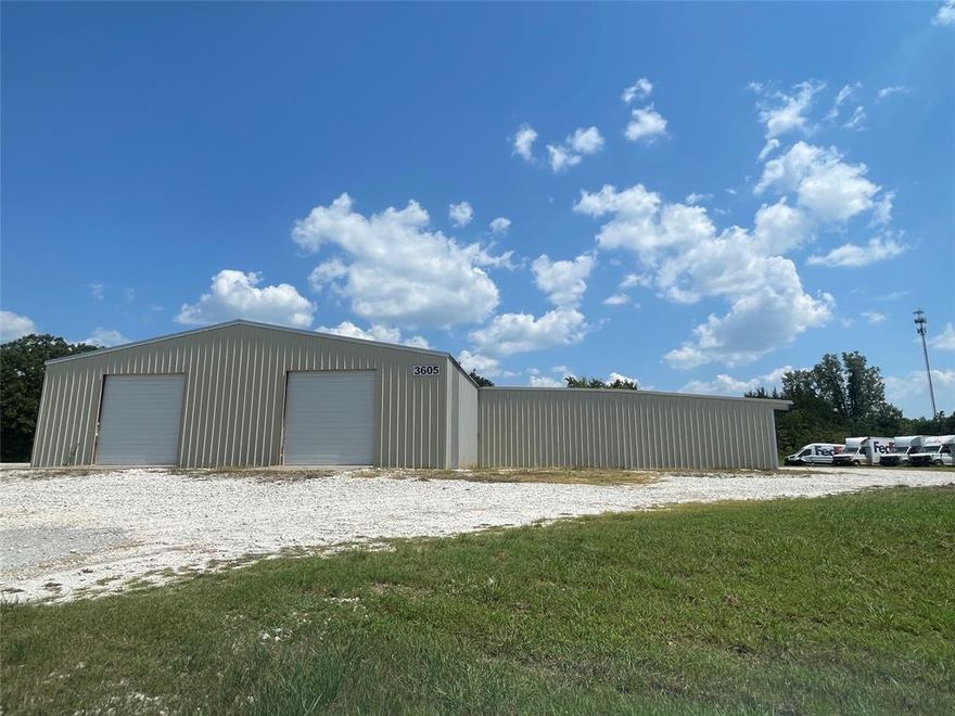 Commercial warehouse on 2 Ac! Recently upgraded with new roof, slab, modern office & restroom.  55 x 60 warehouse features 14 ft walls and 5 roll up doors with concrete approaches.  Additional 23 x 30 space offers 2 more roll up doors.  Covered parking & canopy areas total 2300 sf. and an upgraded electric panel. This versatile location & space also offers billboard income and endless possibilities!