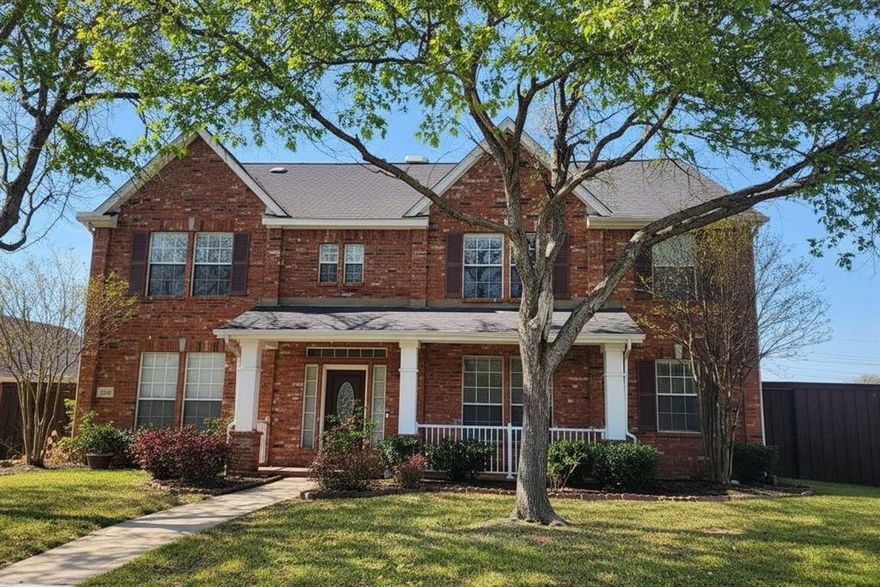 Nestled on a sweeping oversized corner lot, this stunning traditional home offers exceptional privacy, natural beauty & generous space rarely found. Striking two-story brick exterior meets modern curb appeal - where mature trees, clean landscaping & an inviting covered front porch set the perfect welcome-home vibe. Thoughtfully designed for everyday living and effortless entertaining, this magnificent residence features 5 bedrooms, 3 distinct living rooms, 4 full baths & an impressive 3-car garage with extended driveway accommodating 5+ vehicles.
Gleaming hardwood floors and fresh paint flow seamlessly throughout. Entry and kitchen have granite floor tiles. The formal living and dining areas combine into one grand entertaining space, comfortably seating 30 or more guests for holidays & extended family celebrations.
The gourmet kitchen dazzles with granite countertops, stainless steel appliances, captivating backsplash, gas island cooktop with downdraft vent, double ovens, abundant high-quality cabinetry & generous bar seating. Opening beautifully to the bright breakfast area & spacious second living room, both spaces are anchored by a magnificent double-sided gas fireplace that connects warmly to the third extended family room — creating an unmatched entertaining flow perfect for gatherings of any size.
A first-floor bedroom & full bath offer ideal guest suite or home office flexibility. The extended patio invites outdoor entertaining, while a whimsical Hogwarts-inspired hidden room beneath the staircase delights all ages.
Upstairs, the expansive primary suite features dual vanities, an oversized walk-in closet & serene sitting area. Three additional bedrooms each offer ensuite baths & generous closets. A massive bonus room is perfect for media or gaming. 
Single-family owned with quality upgrades throughout. Top-rated Coppell ISD, minutes from Hwy 121, 635, DFW Airport, and premier shopping and dining. 
Come see this Gem of a home and bring your Best Offer.