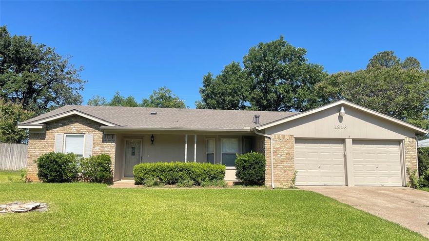 Beautifully updated 3 bed 2 bath home located in central Arlington near coveted Hill Elementary!  The house features split bedrooms, a large family room, and an updated kitchen with granite countertops, backsplash, undermount sink, and pull-out faucet.  Updated bathrooms with granite vanity tops and upscale faucets and accessory.  The master shower has been redone and upgraded completely.   Nice looking paint exterior and beautiful neutral paint inside.  Laminated wood floor for all bedrooms and living room. NO CARPET!   Two-car garage with covered front porch and back patio.  Good size yard with whole house sprinkler system.   Move-in ready and must-see!