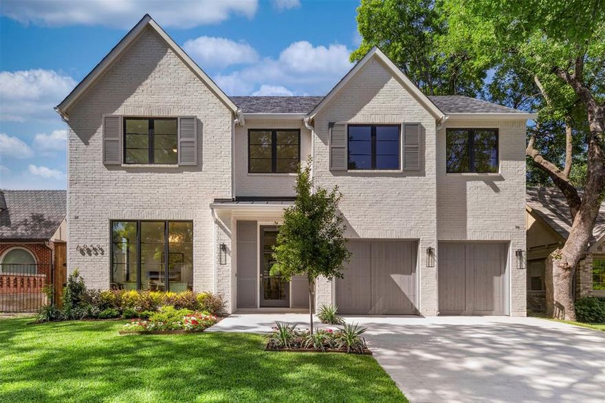 This stunning C street home was built by DH Development, known for their exceptional properties in Lakewood, Preston Hollow, and surrounding neighborhoods. Located on a peaceful block of Casa Loma, the home features a thoughtfully designed floor plan. The spacious kitchen opens seamlessly into the living room, creating a perfect flow for entertaining. The downstairs primary suite offers privacy and comfort, while the three upstairs guest rooms provide ample space for family or visitors. The elegant engineered oak floors and exquisite quartzite countertops add a touch of luxury throughout. A beautiful oversized back patio provides the dream outdoor living area  in this highly sought-after neighborhood.