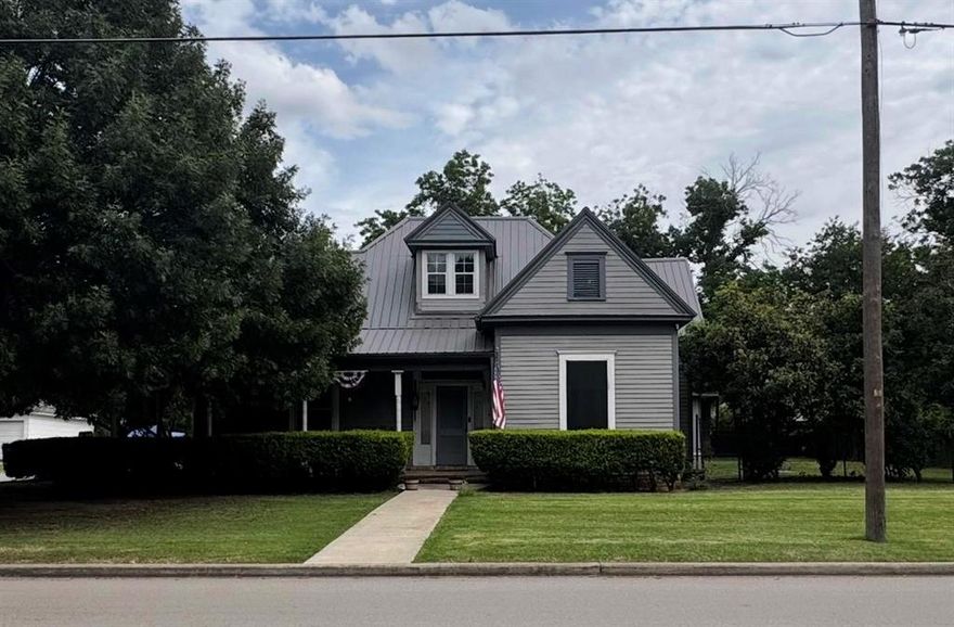MOTIVATED SELLER-Corner double lot with a private backyard, built in 1893.  There have been updates throughout the home, but it still has the charm of a Victorian-era home. There are two bedrooms downstairs with an ensuite and one upstairs. The bedroom upstairs has tons of potential; it would make a great office or flex space. There is a nice-sized family room that overlooks the 15X30 covered back porch. The front porch is brick and has lots of charm. The backyard is fenced and shaded by the large pecan trees. The double-car garage has ample space for you to park your vehicles, and there is also a shop that has room for another vehicle or for storage.