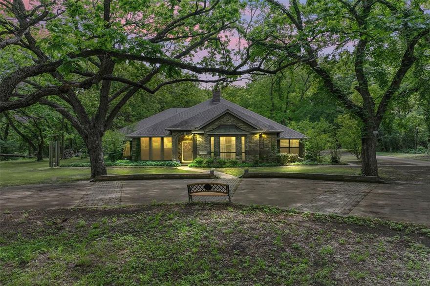 Discover the perfect blend of comfort space and nature. Inside you’ll find spacious living areas ideal for family life and entertaining with a bonus room above the garage. This stunning 3,816 sf home sits on 10 serene and secluded acres. With hundreds of mature trees and bordered by a natural creek on the north and east sides, the property is the ultimate in privacy; like living in your own private campground or nature park.  A 600 foot driveway winds through the trees to the main residence, offering a true sense of arrival.  This spacious estate is also ideal for the possibility of business operations. Featuring a unique layout with large adjoining bedrooms that are perfect for families or a multi use space, this home is designed for convenience and connection.  Multiple bathrooms are thoughtfully placed throughout the home either en suite or just across the hall, offering easy access and privacy for all bedrooms. The game room could also be used as a boardroom.  The land offers plenty of room for storing large equipment, trailers, or commercial vehicles, making it an exceptional choice for entrepreneurs, contractors, or those seeking live work flexibility. Whether you're hosting meetings or enjoying quiet family evenings, this estate adapts effortlessly to your lifestyle.  The property also features a 2400 sf electric powered bldg that is designed for flexibility.  This building could also transition into a secondary living quarter.  Buyers should check with city for all guidelines pertaining to such updates.  While outdoors, you can enjoy the sounds of the creek, explore wooded trails, or host gatherings under the canopy of nature.  This property is ideal for those seeking a rural lifestyle with modern comforts. Whether you're looking for a forever home, multi generational living, or a unique homestead, this property has it all; space, beauty, and freedom. This home is very close to hwys and shopping. Midlothian Texas Schools