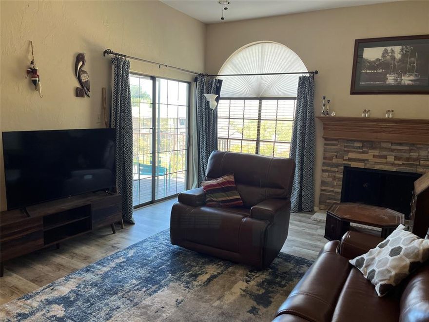 Welcome to your tranquil oasis at Lake Ray Hubbard, where this 1-bed, 1-bath condo with its vaulted ceilings and serene view is a haven of comfort and style. This condo boasts a kitchen with a breakfast bar and a granite countertop which opens to the spacious living area with  vaulted ceilings and a fireplace. One of the standout features of this property is the private balcony, where you can sip your morning coffee or enjoy a glass of wine while watching the sailboats and soaking in the mesmerizing lake views.  Located just a short drive from Dallas, you can enjoy the peaceful lakeside lifestyle while still having easy access to the city's vibrant attractions and amenities. Don't miss your chance to experience lake living at its finest. Schedule a showing today and make this condo your new home sweet home.