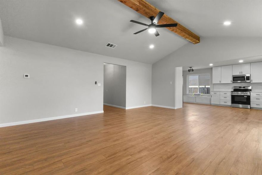 Welcome to 414 Hallmark Drive—where timeless charm meets modern living in the heart of Arlington, TX. This beautifully renovated single-family home offers thoughtful upgrades throughout, making it ideal for single professionals, families, or savvy buyers looking for a move-in-ready gem. Step into a bright open-concept layout featuring a vaulted ceiling, custom J&K cabinetry, brand new Frigidaire kitchen appliances, and premium quartz surfaces in the kitchen and bathrooms. Entertain with ease in the spacious living room or cook up your favorite meals in the chef-inspired kitchen, all while enjoying views of your back yard. This surprisingly quiet neighborhood is merely minutes from restaurants, shopping, cafes, health care, entertainment, and more! You'll be in the center of the DFW Metroplex with quick access to I-30 and 360, ensuring a convenient commute no matter where you work, play, or go to school in the greater DFW area! Bonus: Cowboys fans will be thrilled to know that they'll only be 1.2 miles from AT&T Stadium.

Every inch has been updated for comfort and convenience—brand new 12mm waterproof laminate wood flooring flows throughout, paired with commercial-grade durability and wide plank style. The bathrooms shine with new tile, lighted defog mirrors, and upgraded fixtures. All popcorn ceilings have been removed and retextured, giving the entire home a sleek, modern feel.

Enjoy peace of mind with a new Goodman 3-ton HVAC system (includes 1-year labor & 10-year parts warranty), a brand new garage door and opener, and new dual gate access for boats, trailers, or additional parking. All new windows with a lifetime transferable warranty bring energy efficiency and natural light. The roof is under 5 years old, with gutters and leaf guards added less than 2 years ago.

Don’t miss your chance to own a fully updated home in one of Arlington’s most connected neighborhoods!