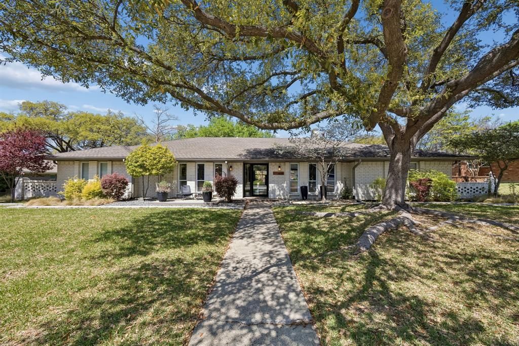 Photo of 6935 Town Bluff Drive, Dallas, TX 75248 (MLS # 21260363)