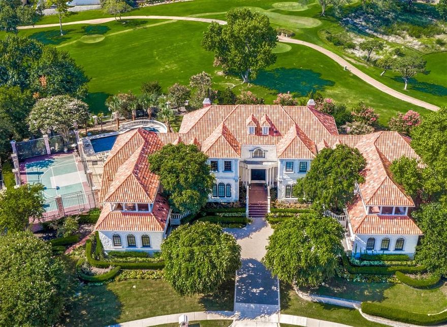 Breathtaking Las Colinas Golf Course estate on 0.82 acres! Almost 10,000 sf of luxury designed to inspire. One of the highest points in Dallas County overlooking the Four Seasons Golf Course and Las Colinas. Main floor has dining, study, bar, family room, living room, HUGE Master and 2 addtl beds with ensuite bath. Fabulous oak flooring, incredible millwork, crown molding, & wood cased arches throughout the home. Take the elevator to the 2nd floor to find guest suite with separate living, incredible gameroom & wetbar, exercise room, workroom & large 5th bedroom. Full size sport court for basketball and tennis with heated pool and spa secluded by mature landscaping. Two oversized two car garages with work areas.