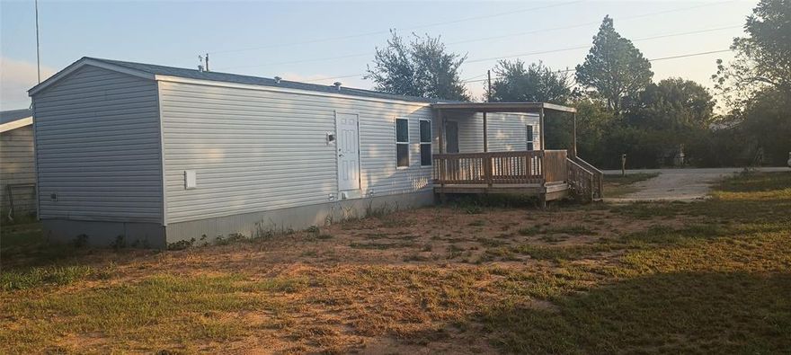 2022 Champion manufactured home 3 bed 2 bath home on a 15,000 sq. ft. lot. Which makes lots of room for a garage or whatever? 2x6 Exterior walls, wind zone 3 home. 12x12 covered front deck, Skirting is 2x4 wall with real wood. This home has been converted to real property and has been attached to property. This lot is removed from HOA. It is IN compliance with ALL deed restrictions.  This home is in it's 2nd location. Home was set by State certified installer. Home is move in ready.