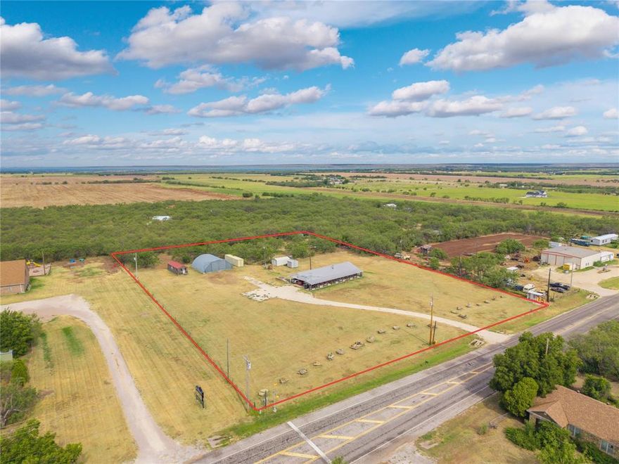 Great home and a great location 0n 3.444 acres in Eula, Texas within walking distance to a growing Eula ISD with amazing educational and athletic facilities and ranked as one of the top school districts in Texas (per niche.com) with high marks in Academics, Teachers, College prep, Activities and Administration. 
 An approx. 85 ft. long front porch welcomes visitors & is the perfect place for morning coffee or just relaxing on the porch swings. The home features a metal roof & inside is an open floor plan & a beautiful fireplace with insert. The kitchen features an island-bar with seating for 5 + an additional dining room, granite counter tops and stainless steel appliances. 3 bedrooms are spacious with sufficient areas for king size beds. The lg. utility-pantry provides plenty of space for storage. Newer double pane windows & spray foam in the attic will help reduce electric cost. There is an attached carport for 4 vehicles + the lg. 38'x45' shop-storage quonset bldg. offers place for additional covered parking & a 10'x20' bldg. also conveys. There is also a separate RV location that has a septic tank, electrical & water + a concrete storm cellar in good condition. A water well (possibly shallow)  is on the property but condition is unknown as current owner has  never used the well.