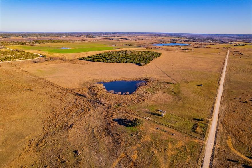 Excellent opportunity to own 20 acres in the country! You've found your fishing honey hole with a beautiful 2 acre pond on site. Cattle pens in great shape makes this property turn key. There is an older water well on site in unknown condition. Stunning views of Dinner Hill, a historic elevation site that was used as a guide point for native Indians and was later mined for precious minerals. Go and see this affordable acreage and enjoy the peace and quiet!