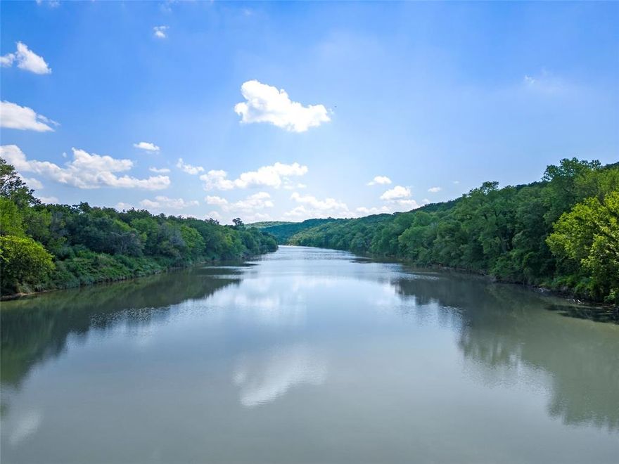 Prime Riverfront Opportunity! Expansive ~128acre property along the Brazos River with Hwy 67 and CR frontage, offering unmatched visibility and potential. Located just outside Glen Rose, TX—the Dinosaur Capital of TX and a top tourist destination-under an hour from Fort Worth and Dallas, and 15minutes from Granbury, America’s Best Historic Small Town. With over 1,000 feet of Hwy 67 frontage and a half-mile of riverfront, this property is highly desirable and visible. Glen Rose attracts over 400,000 visitors annually, boosting the local economy. Year-round events in Glen Rose and Granbury further enhance the property’s appeal. With no zoning or restrictions, this property offers tremendous opportunities. Preliminary engineering for an RV-Tiny home resort is available, but the land is also perfect for those who simply want a scenic and versatile piece of riverfront land. This unique investment opportunity offers immense potential for residential, recreational, or personal enjoyment.