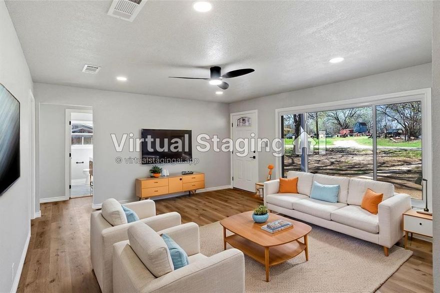 Excellent investment opportunity, this home is currently tenant occupied! This beautifully remodeled home with plenty of modern upgrades! From the moment you arrive, the charming covered front porch invites you to relax and take in the peaceful surroundings. Inside, natural light pours through the large living room windows, creating a bright, welcoming atmosphere. The home feels fresh, clean, and completely move-in ready with all-new flooring throughout. The eat-in kitchen is designed for both everyday living and entertaining, featuring a center island, brand-new appliances, and a functional layout perfect for gathering with family and friends. Both bathrooms have been fully renovated with stylish tile work, new vanities, and modern fixtures. Enjoy peace of mind with extensive major system upgrades, including: Brand-new tankless gas water heater, New septic system, New HVAC system, and New plumbing system. Step outside to the large covered back porch, perfect for relaxing or hosting guests, along with the convenience of a carport. The spacious lot offers plenty of room for outdoor activities, gardening, or simply enjoying the open space. Conveniently located just outside of downtown Bowie, this thoughtfully updated home is an ideal investment!