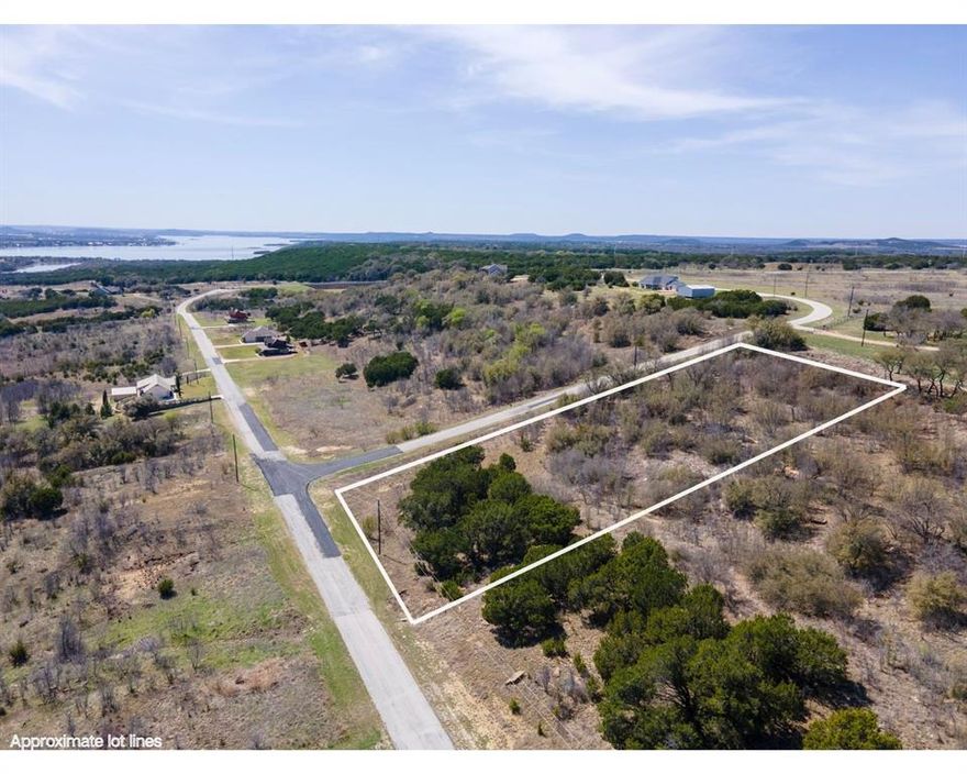Build your dream home on this beautiful 1.01-acre homesite in the gated community of The Hills Above Possum Kingdom Lake. Ideally positioned for convenience, this property offers an easy drive to both Graham and Mineral Wells for everyday dining, shopping, and services. Located within a smaller section of the development, the lot provides an added sense of privacy and exclusivity. Enjoy sweeping Texas valley views from this elevated hillside setting, with the potential for distant lake views from a future second story. The seller has already completed a survey and engineering report and is willing to share building plans with the next owner - saving valuable time as you begin the building process. A fantastic opportunity to secure a prime lot at PK Lake and start planning your custom lake retreat.