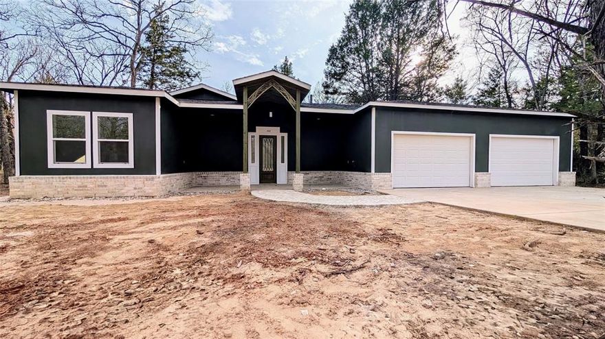 Welcome to your one of a kind dream home!  This beautifully designed 3 Bedroom, 2.5 bath residence offers a seamless blend of modern luxury and functional living.  As you enter, you are greeted by an expansive (28'x31') open concept living and dining area, perfectly designed for both entertaining and relaxing.  The heart of this home is the highly upgraded kitchen, featuring top tier finishes such as Invisicook (induction) cooktop, porcelain countertops, stainless steel appliances, pantry and more that will inspire any home chef.  A one of a kind highlight is the unique 8'x8' skylight, bathing the home in natural light. The 12'x5' laundry room houses the two tankless water heaters.  One is for the master bath only and the other takes care of the remainder of the home.  The guest bath is 6'x12' and has a tiled shower and tub combination and the half bath is 4'x8' and located near the entrance of the home.  This 20x20' primary suite is a true retreat, boasting an 8'x20' walk in closet, and a luxurious spa like bathroom complete with a large 55 inch round stone soaker tub and a separate 5'x5' walk in shower.  In addition to the three spacious bedrooms, a dedicated office (12'x12') provides the perfect space for remote work.  Don't miss this opportunity to own a move in ready new construction premium home.  Schedule your showing today!!