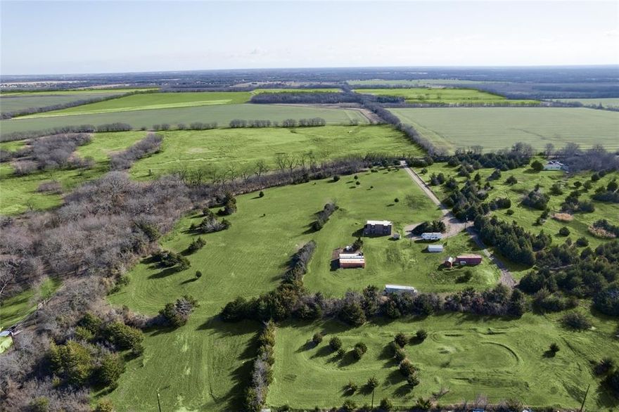 12.5 Acres of Opportunity — Only 30 Minutes North of McKinney!
Welcome to a rare and versatile land offering located in the peaceful Texas countryside between McKinney and Sherman. Situated outside city limits, this expansive 12.5-acre property offers the freedom, space, and flexibility to bring your vision to life. Whether you’re planning to build a custom dream home, create a private retreat, or invest in future development, this property provides endless possibilities.
The land is already equipped with water, electricity, and an existing septic system, significantly reducing upfront development costs. At the center of the property sits a 2,112 square foot steel beam structure. While the structure is currently uninhabitable, it rests on a solid concrete foundation and presents an exciting opportunity for redevelopment. With the right builder or contractor, the footprint could be transformed into a workshop with living quarters, a barndominium-style project, or an impressive outdoor entertaining space.
Adding even more value, the seller is providing four years of agricultural exemption application documentation, offering a strong foundation for buyers looking to maintain or pursue an ag exemption moving forward.
What truly sets this property apart is its tranquil setting. Wide-open skies, gentle breezes, and breathtaking Texas sunsets create a sense of privacy and calm that’s increasingly hard to find. Enjoy peaceful mornings, long walks across your own land, and evenings spent watching the sun dip below the horizon.
Conveniently located just a short drive from Highway 75, you’ll enjoy easy access to shopping, dining, and amenities while still feeling a world away from the hustle and bustle. Whether you build now or hold for the future, this property offers an exceptional blend of location, freedom, and potential. Conex containers and additional storage buildings will be removed prior to closing.