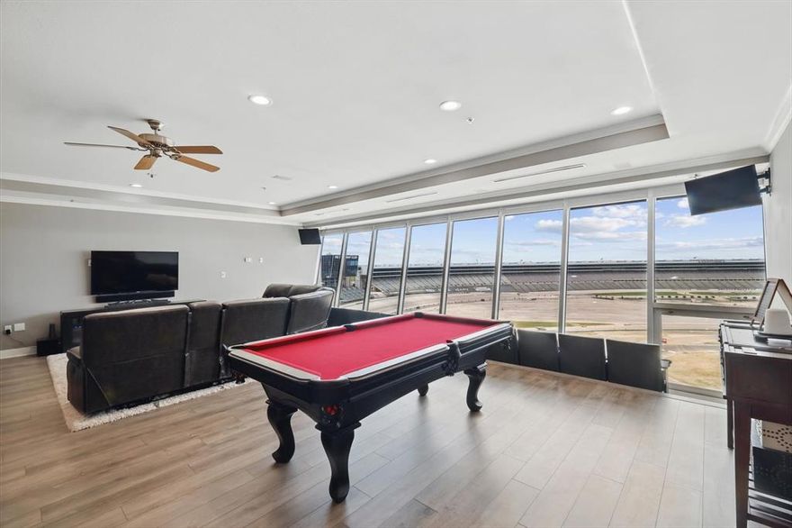 WOW! COMPLETELY REMODELED! One of the most unique luxury condos in DFW! Unit #909 is on the 9th floor & overlooks Turn 2 on the track at the Texas Motor Speedway! Entertain friends, family, or clients from your fantastic condo!  2 beds, 2 baths! Whip up your favorite meals in your spacious kitchen with TWO islands with gorgeous granite and custom cabinets! Enormous living & dining rooms! Awesome floor to ceiling windows! Watch the races with the best view in town! Built-in stadium seating and remote blinds on trackside windows! Fantastic master bedroom & walk in closet! Move in ready! Amenities: race tickets, Texas shaped pool, gym  garage parking, basketball, pickleball, and tennis! Lone Star Tower is a small community with only 76 units. There is a private clubhouse that can be rented for social gatherings. A versatile property with full or part time living, or as an investment property with long & short term rentals! Across from Tanger Outlets & restaurants! Year-round fun with car shows, concerts, events & holiday activities. Live here, play here, relax here, invest here at TMS! Home may be sold furnished, excluding primary bedroom furniture and safe, with strong offer. Ask listing agent for details.