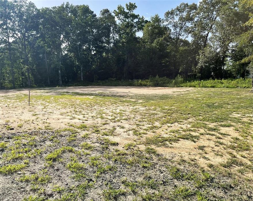 A cleared lot over a half acre featuring a 70' X 75' house pad already prepared.  A culvert has already been installed and rock spread on the driveway entrance.   Nice new neighborhood waiting for your custom-built home.  Some Beautiful homes have already been built.  Enjoy the peaceful charm of country living minutes outside the city limits of Stonewall.  Desoto Parish schools.  PRICE is REDUCED!

-Disclosure attachments include Plat & Restrictive Covenants
