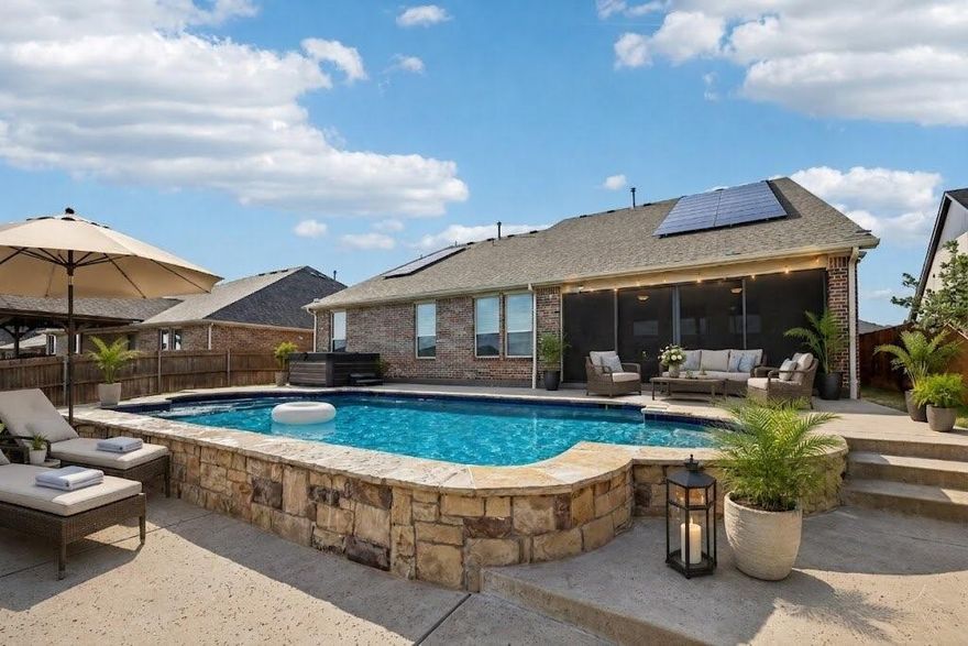 Welcome to this beautiful home offering a sparkling pool, fully OWNED solar panels, and a brand new roof! Step inside to warm wood flooring, abundant natural light, and an open-concept living area anchored by a cozy gas fireplace. The kitchen features stained cabinetry, granite counters, stainless steel appliances, and a gas cooktop, flowing seamlessly into the dining area for both everyday living and entertaining. The primary suite is privately situated on the main level, separated from secondary bedrooms and complete with a spa-style bath featuring a garden tub, separate shower, and dual vanities. A dedicated main-floor office provides flexible work-from-home space. Upstairs, a generous second living area works as a game room, media room, or kids' retreat. Step outside to a private backyard oasis with sparkling in-ground pool, hot tub, and screened-in patio built for year-round Texas evenings. Standout upgrades include a fully OWNED solar panel system keeping energy bills remarkably low, an EV charger in the 2-car garage, and extended fencing for added privacy. Enjoy proximity to Eagle Mountain Lake, shopping, and dining, with quick access to Hwy 199, I-820, and I-35W.