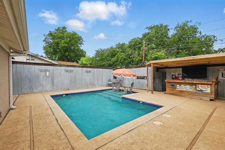 Backyard Bliss At A REDUCED PRICE!! — 8832 Kate St, Fort Worth, TX

Tucked away on nearly a quarter-acre in the heart of White Settlement ISD, this move-in ready gem delivers space, style, and serious backyard swagger. With 3 bedrooms, 2 full baths, and 1,810 square feet of smart layout, this home checks every box—and then some.

The kitchen is a head-turner with upgraded cabinets, granite countertops, and wood-look flooring that flows through generously sized bedrooms and a massive living area built for movie nights or holiday gatherings. Newer windows bring in the natural light, while the huge utility room and extra storage keep the clutter out of sight.

Step out back to your personal retreat: a low-maintenance heated pool, private bar area, and zero nosy neighbors behind you. Whether you're hosting game day or just soaking in the peace, this backyard is built for good times and quiet moments alike.

No HOA. Gated, covered parking. Plenty of privacy. Immaculately maintained and clean as a whistle.

**Welcome to 8832 Kate St—where comfort meets character, and every day feels like a staycation.**