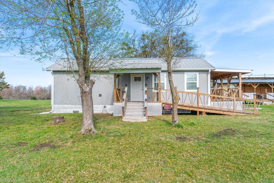 Experience peaceful country living with the convenience of nearby amenities in this inviting 800 sq ft, 1-bedroom, 1-bathroom home situated on a beautiful 5-acre tract just outside Terrell in the College Mound community. This property offers the perfect blend of comfort, privacy, and usable land, making it ideal for anyone seeking a quiet retreat, a starter home, or a manageable homestead. The home features an efficient layout with a cozy living area, functional kitchen, and a comfortable bedroom and bath. With plenty of windows to bring in natural light and provide relaxing views of the surrounding acreage. Whether you’re looking to downsize, invest, or enjoy a simpler lifestyle, this home delivers practical living with room to grow. Outdoors, the property truly shines. A covered RV parking area with an attached porch and hook-ups installed provides excellent protection for your recreational vehicle, additional storage, or a shaded space to relax and enjoy the open land. With five acres to work with, there’s ample room for livestock, gardening, expansion, or future building projects. The land offers a peaceful setting with plenty of possibilities for customization. Located just minutes from Terrell’s shopping, dining, and major highways, this property provides the serenity of rural living without sacrificing convenience. Opportunities like this—manageable acreage with a move-in-ready home and RV accommodations don't come along every day -- A great chance to own land, enjoy privacy, and create the lifestyle you’ve been looking for.
