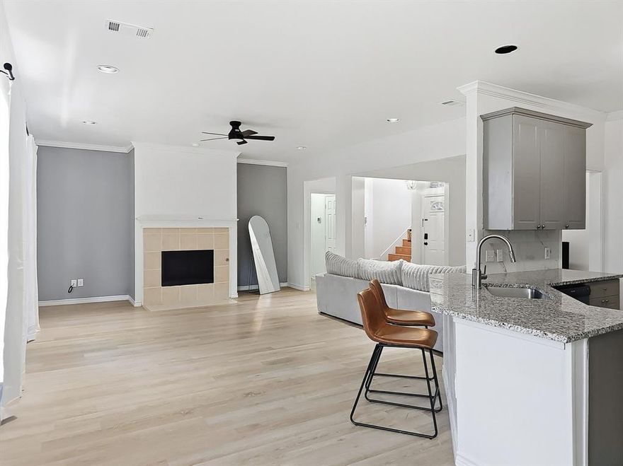 Beautifully remodeled two story home located in a desirable Garland neighborhood. Featuring 4 spacious bedrooms with 2 and a half bathrooms. An inviting layout highlighted by a cozy fireplace in the large open living area with plenty of natural lighting. The updated kitchen offers new SS appliances, granite ctops, 42inch cabinets and breakfast area for everyday dining or morning coffee. Primary bedroom is downstairs with ensuite bathroom. Upstairs, you'll find 3 generously sized bedrooms and an updated bathroom. It is conveniently located near schools, Firewheel Mall, dining and major highways.