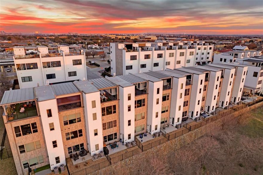 Overlooking the serene waters of Lake Lewisville with sweeping sunset vistas, this exceptional luxury townhome offers an unrivaled convergence of refined design, comfort, and sophistication. Featuring 3 generously appointed bedrooms, 3 full bathrooms and 2 half bathrooms across four meticulously crafted levels, it is designed for both distinguished entertaining and serene respite. The expansive terrace is an outdoor sanctuary, complete with built-in barbecue with prep station, fireplace, hot tub, low-maintenance turf, and a covered pergola with electric shade—perfectly framed by calming lakeside views. Within, an open-concept layout integrates a gourmet kitchen—replete with custom cabinetry, upscale imported appliances, and premium finishes—with living areas adorned with tray ceilings, integrated lighting, and a sculptural decorative fireplace. The spa-inspired primary suite exudes tranquility with its freestanding soaking tub, glass-enclosed shower, and refined finishes. Elevated design is evident in every detail—from Level?5 finishes, upgraded hardware, and architectural lighting to a private in-home elevator affording access to all levels, multiple balconies, and an oversized garage with generous storage. The residence is set within the exclusive Westport Lakeview Villas, an intimate gated community of just 33 townhomes offering scenic walking trails, pristine lake access, and low-maintenance living for today’s discerning buyer. Residents enjoy amenities such as a lakeside pool, dog park, and BBQ pavilion, while also benefiting from the area's thriving entertainment, shopping, and culinary destinations—just minutes from Grandscape, Legacy West, PGA Frisco, and The Star. Additional highlights include smart-home automation, energy-efficient construction, and builder-upgraded rooftop terraces that elevate the lifestyle experience and distinguish this property as a premier offering in lakeside luxury living.